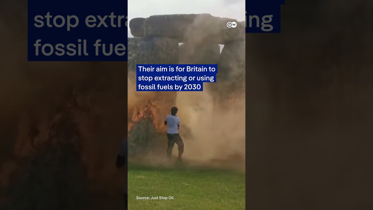Environmental protesters spray orange paint on Stonehenge | DW News