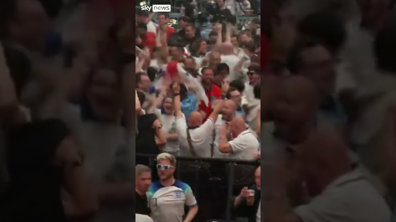 Fans celebrate England’s goal against Denmark