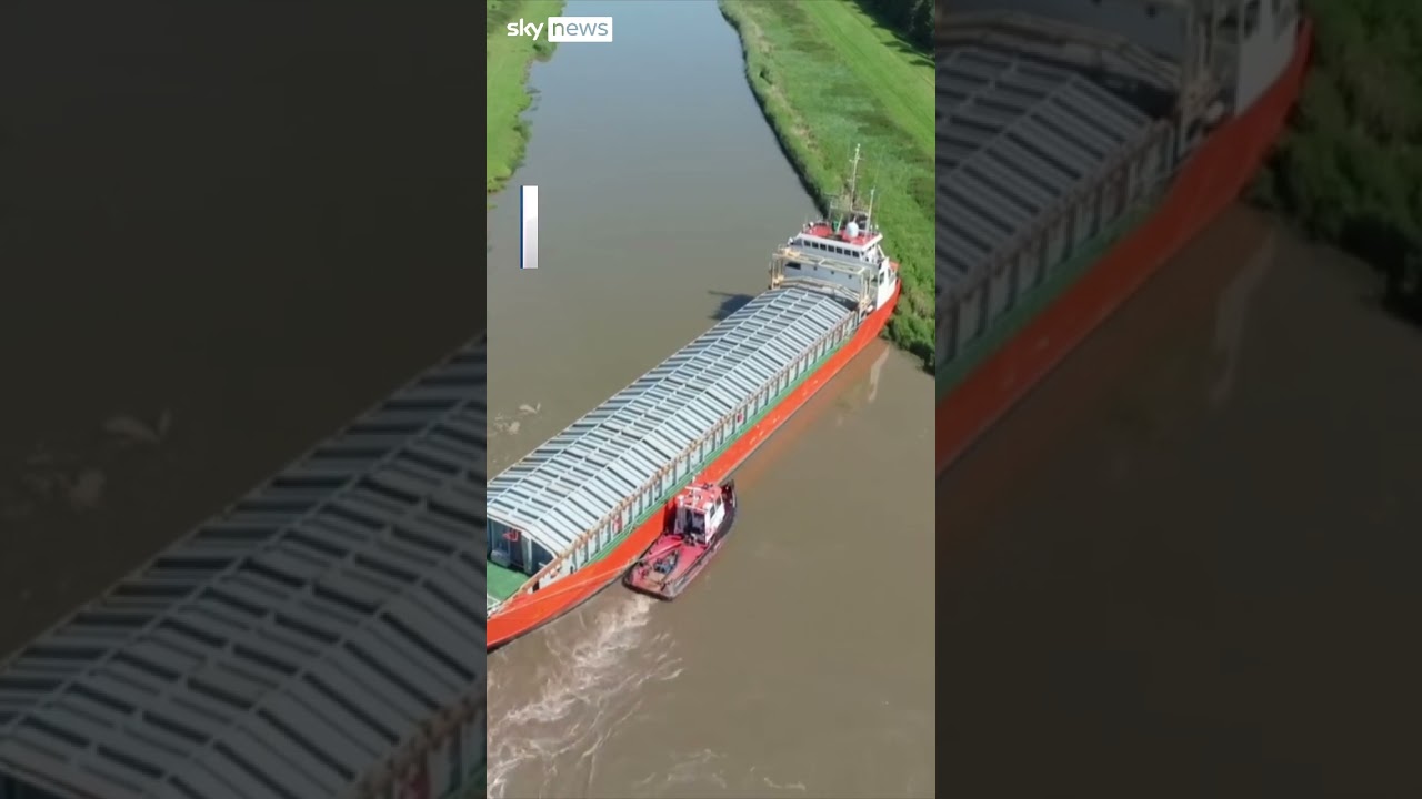 Footage shows cargo ship stuck in river