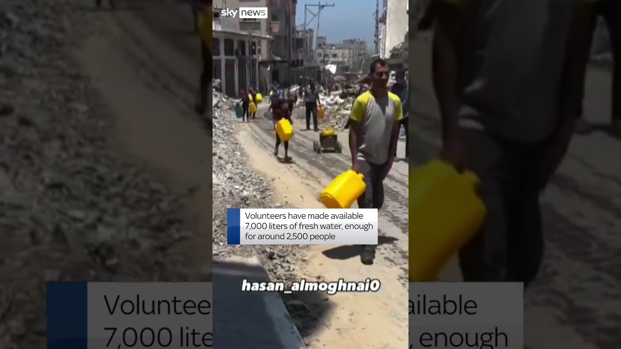 Gaza children run for water