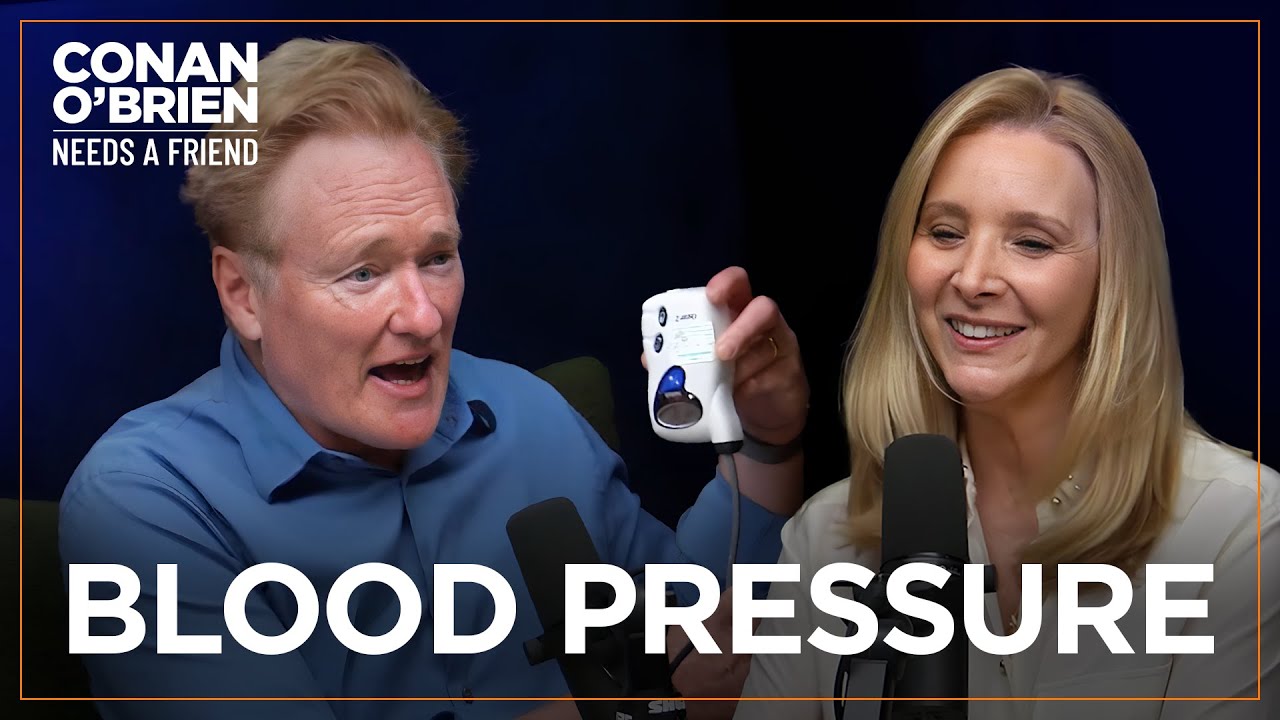 Conan Shows Off His Blood Pressure Monitor (Feat. Lisa Kudrow) | Conan O’Brien Needs A Friend