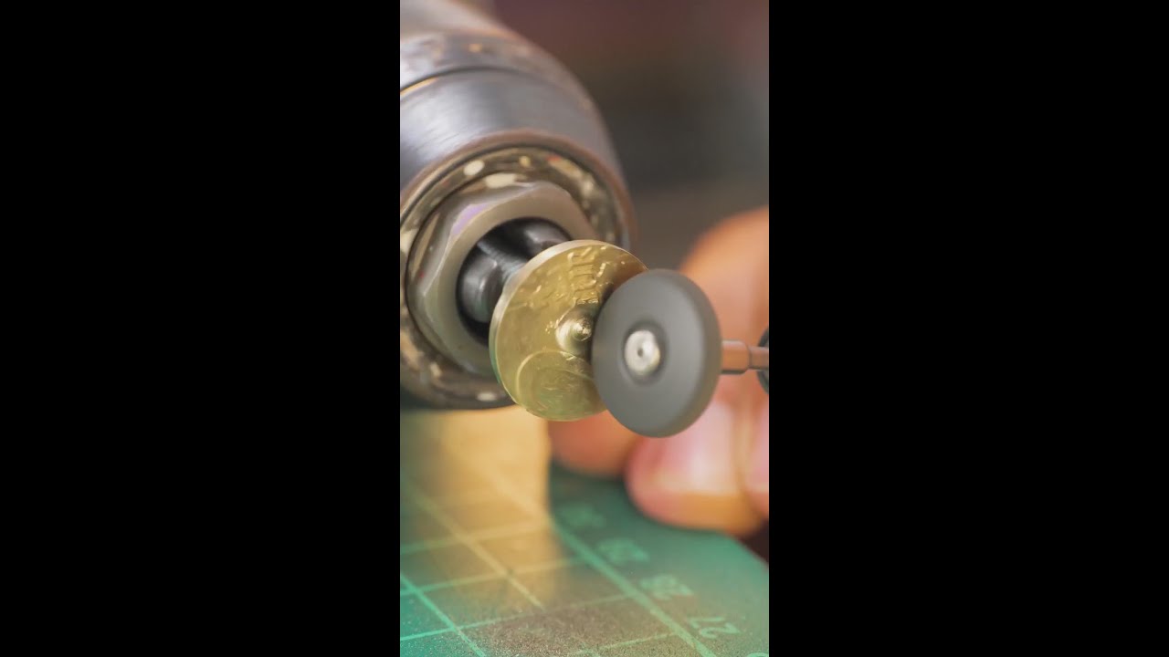 He transformed a coin into a goldfish pendant