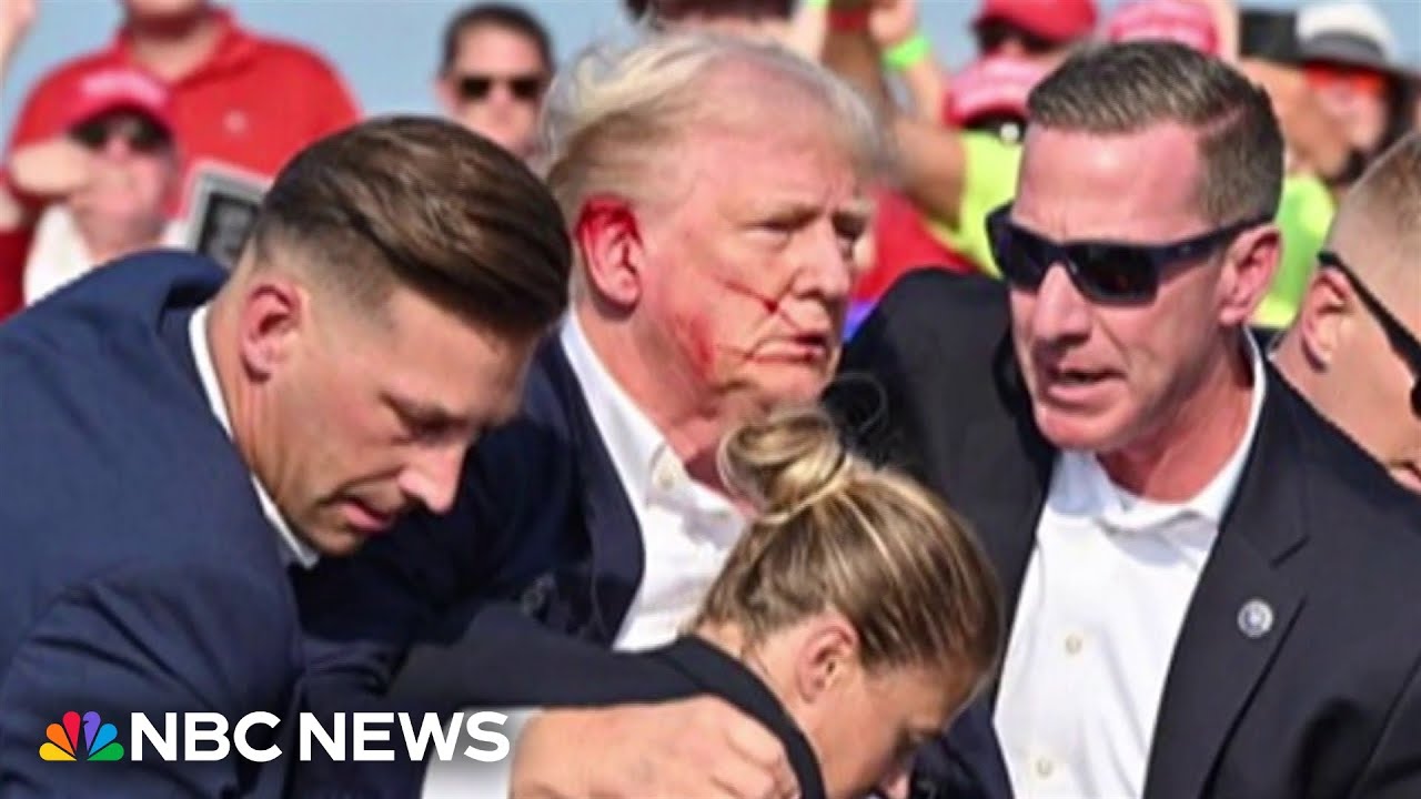 Photographer at rally says bullet took out piece of Trump’s ear