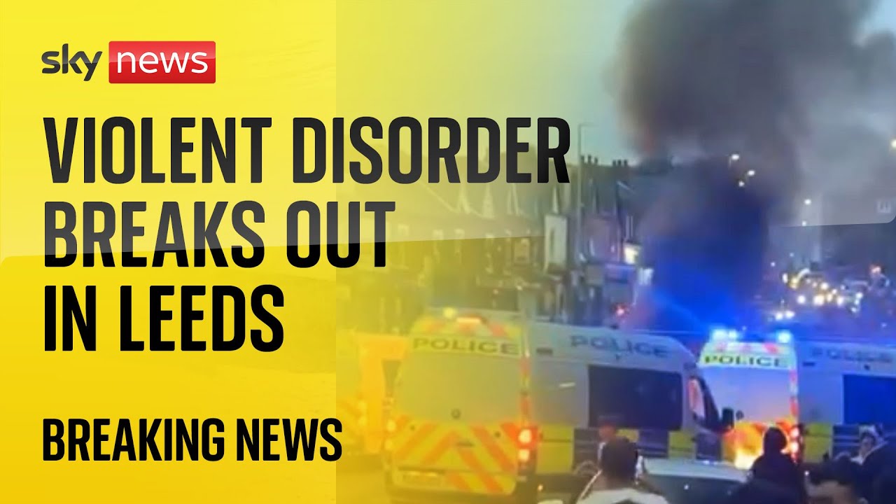Police car turned over as unrest breaks out in Leeds