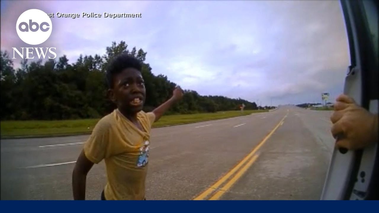 Body camera footage shows woman rescued from submerged car after son flags down police