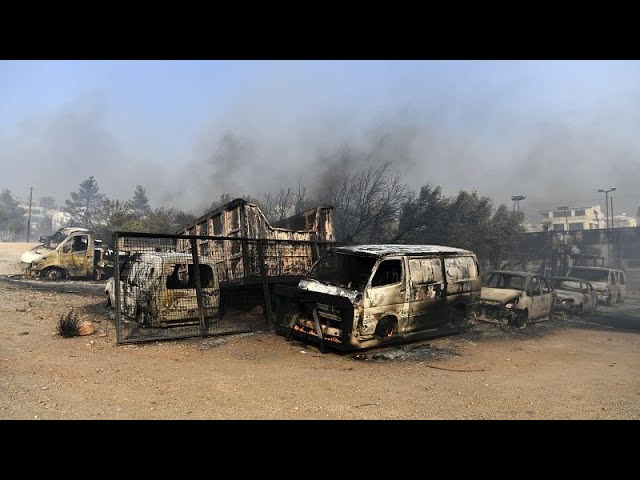 One dead and homes burnt to ground as fires die down in Greece