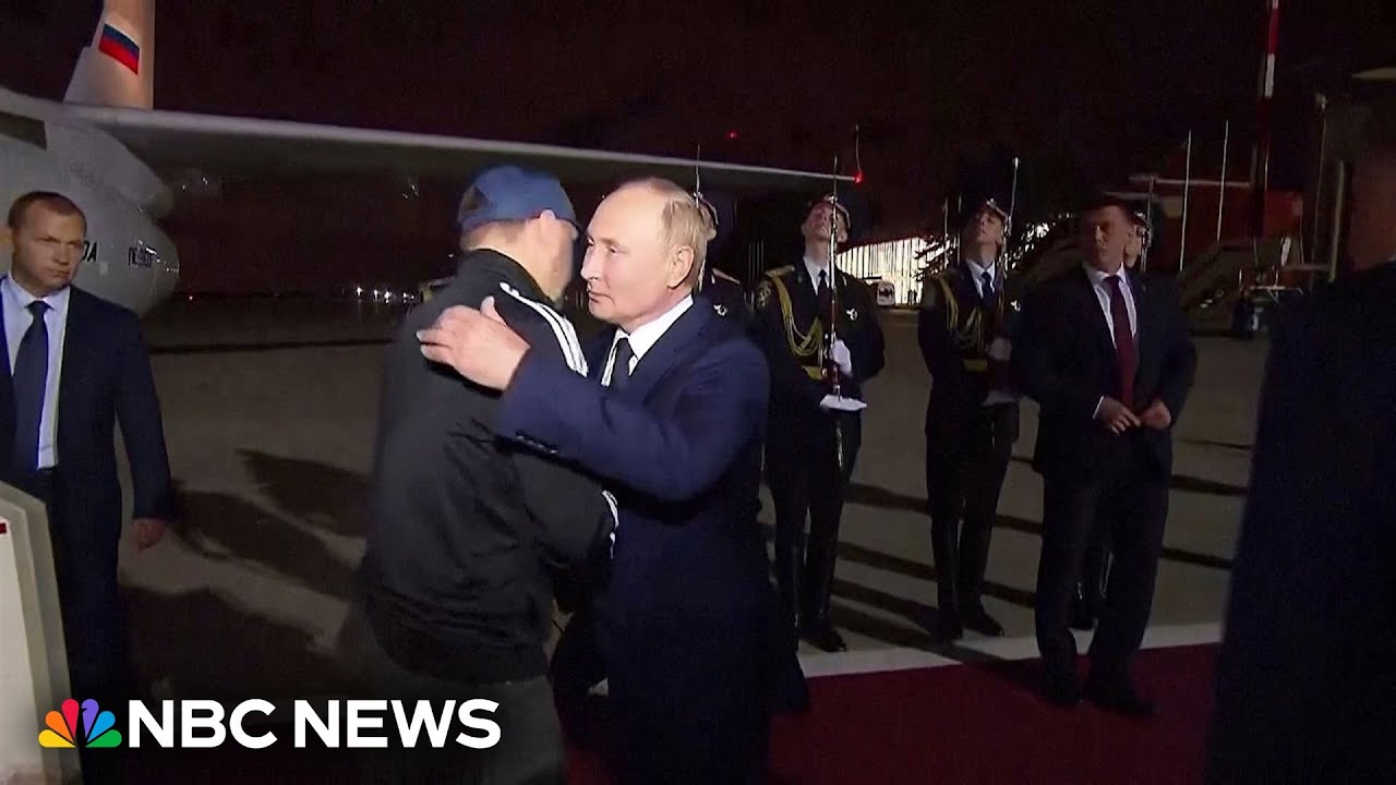Putin greets released prisoners arriving in Moscow