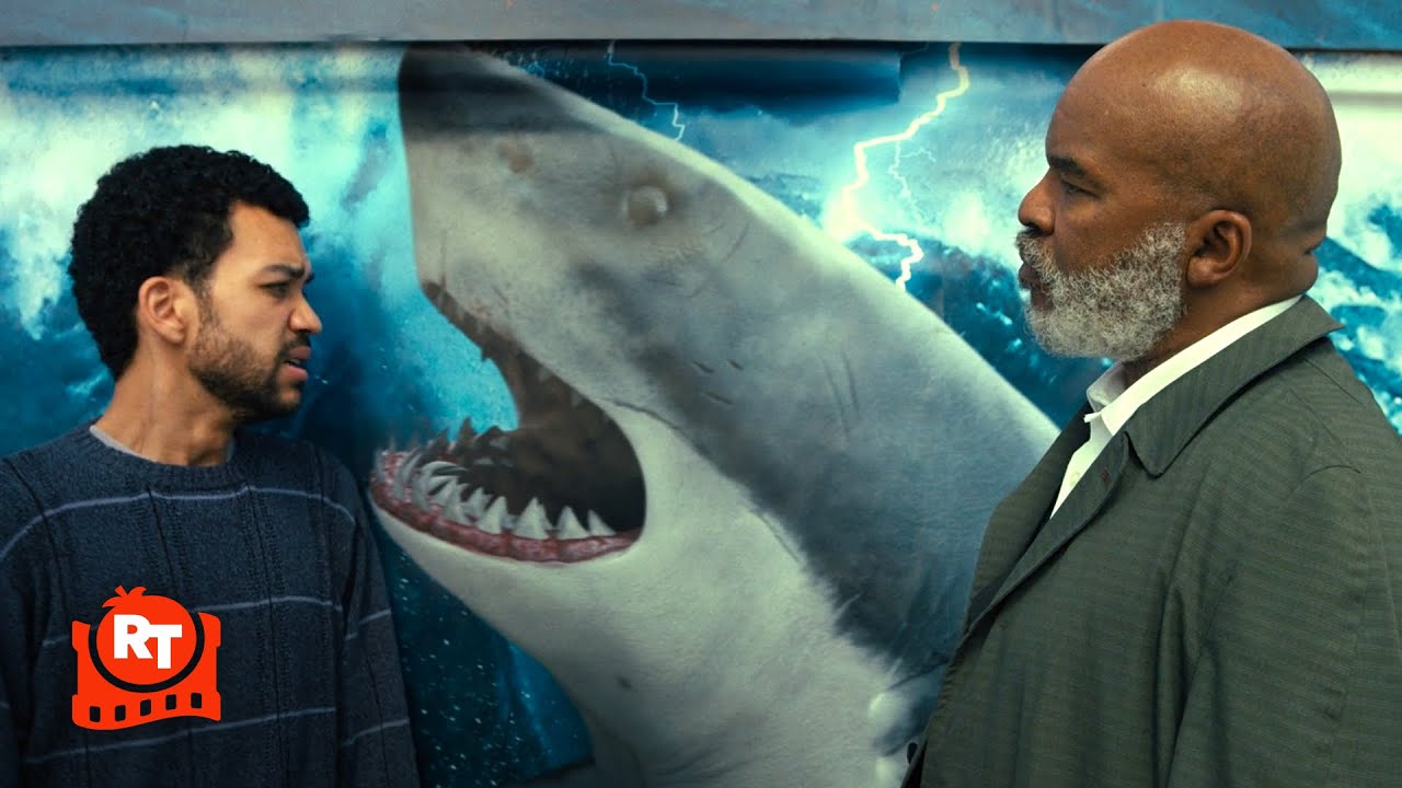 The American Society of Magical Negroes (2024) – The Most Dangerous Animal on the Planet Scene