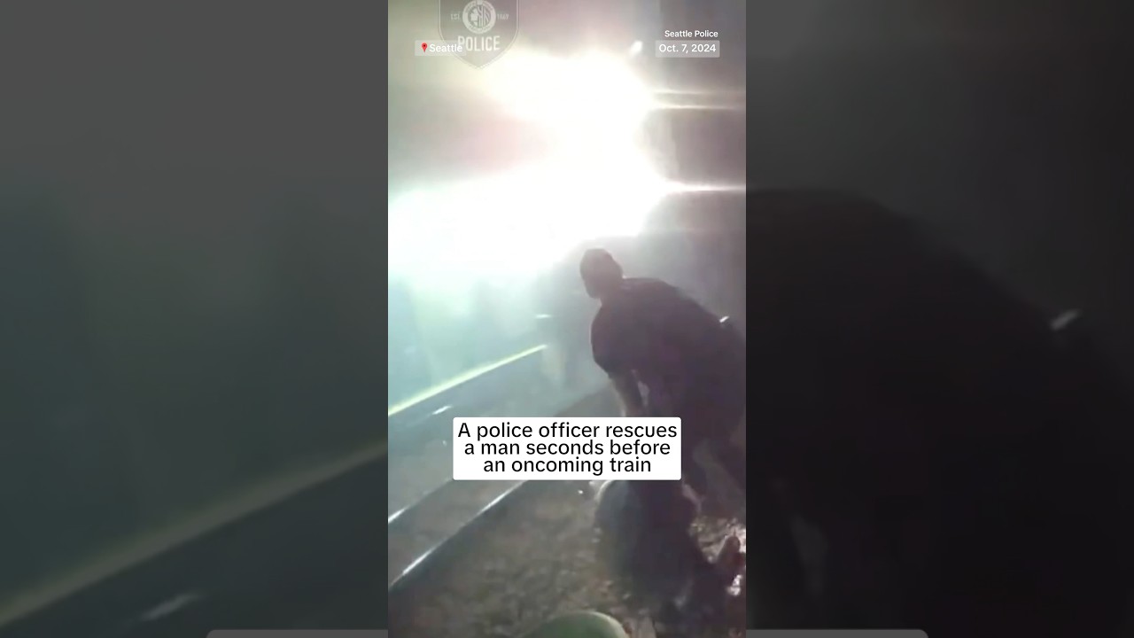 Man rescued from tracks seconds before train passes ￼