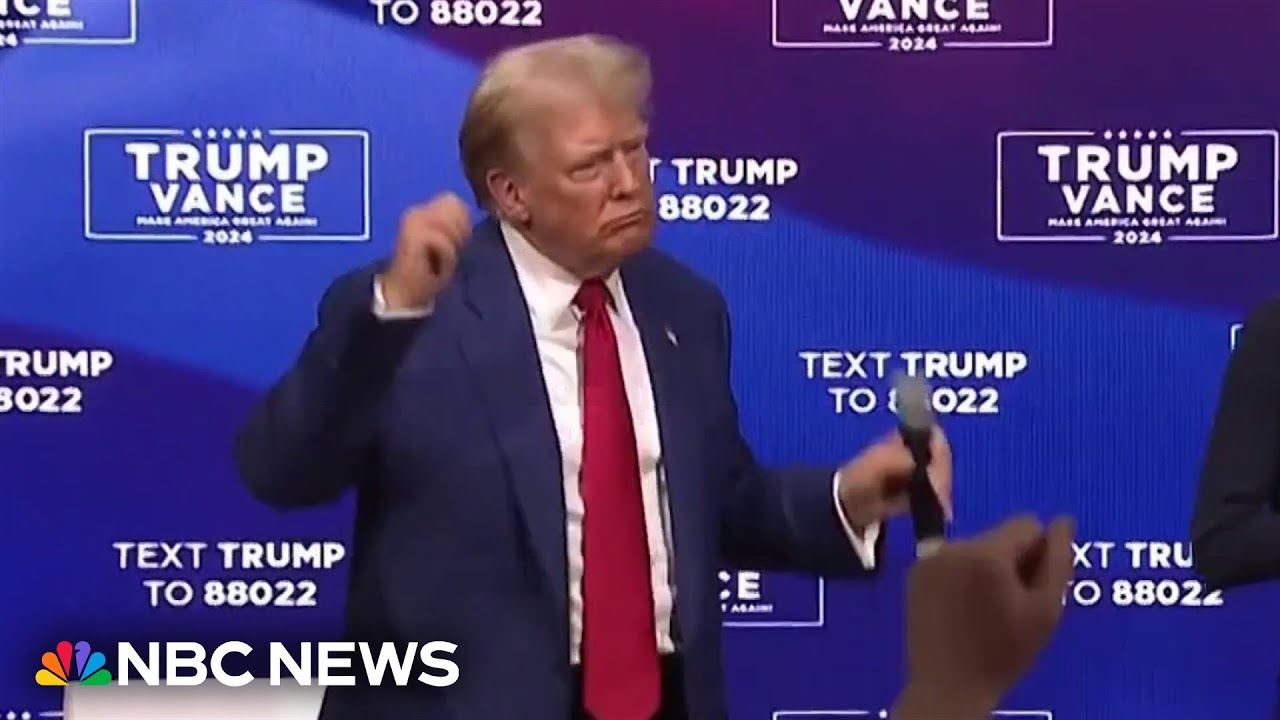 Trump stops answering questions to play music at town hall as Harris questions his fitness