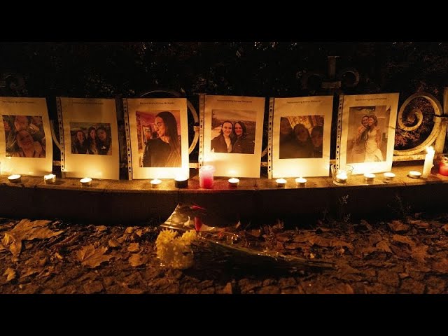 Friends and family of American tourist killed in Budapest hold vigil, suspect in custody