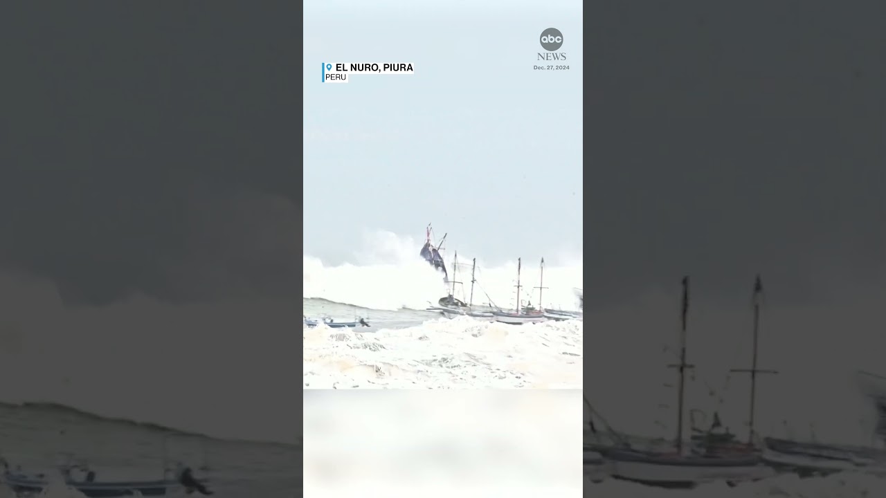 Boats toppled by large waves in Peru