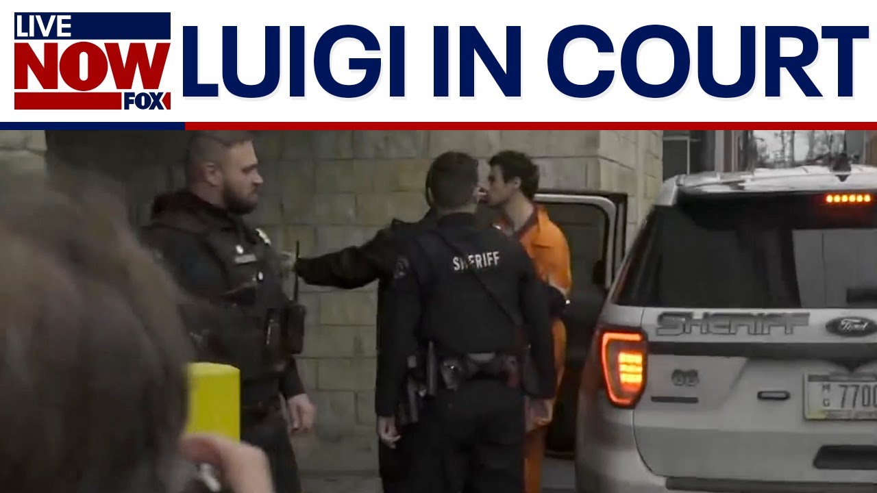 Luigi Mangione led into court for hearing, yells at reporters