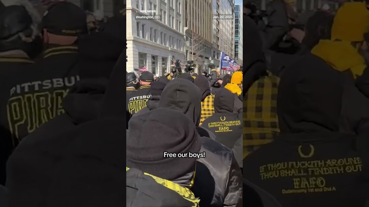 Proud Boys chant outside Capital One Arena inauguration watch party