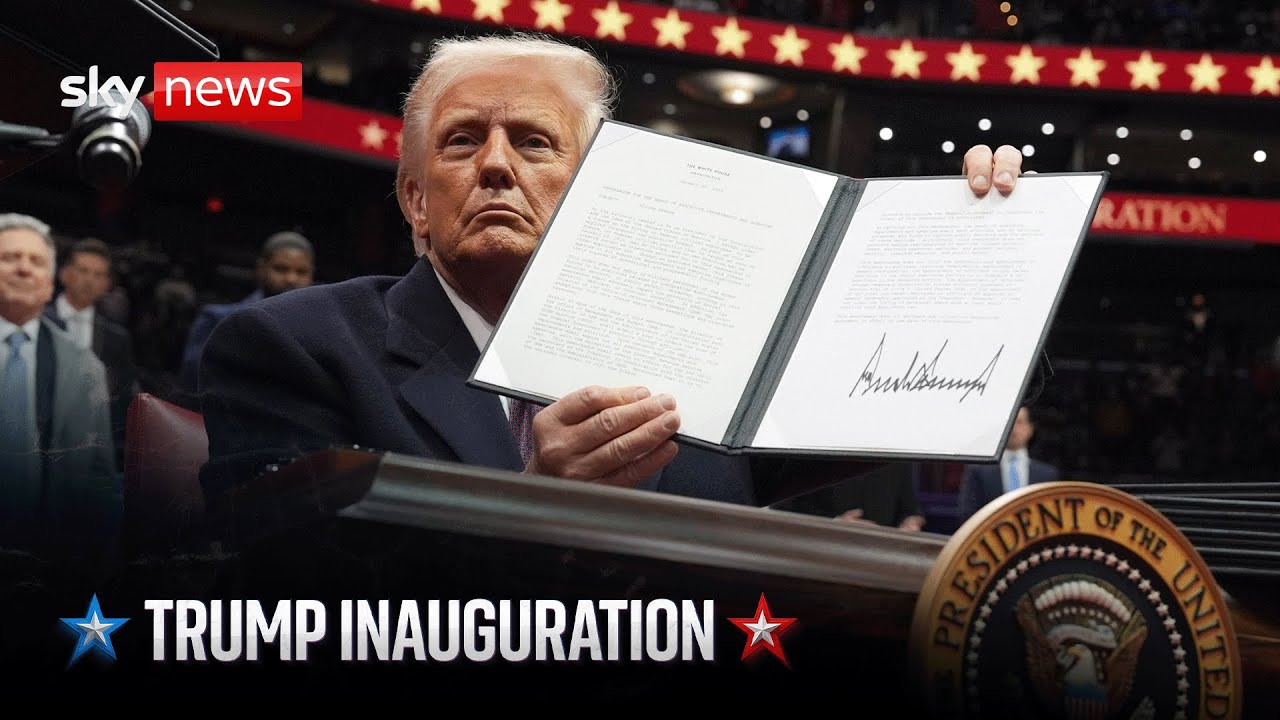 Trump signs executive orders at inauguration parade in Washington