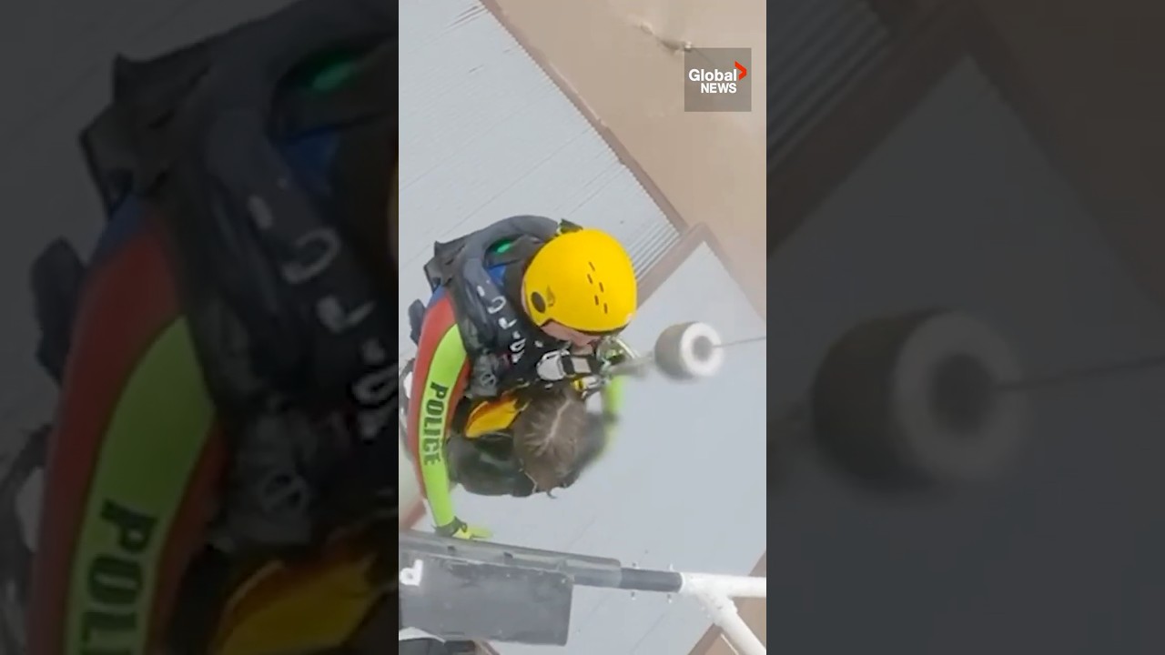 Australia floods: Emergency crews rescue stranded residents from rooftops