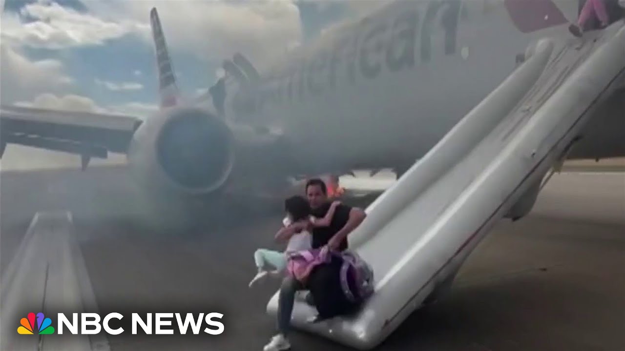 Video shows passengers evacuating American Airlines plane