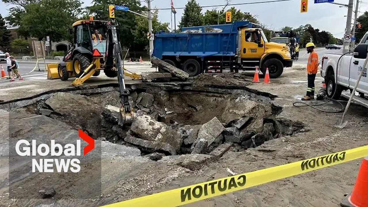 “A big one”: Sinkhole opens at busy Toronto intersection, nearby basements flooded