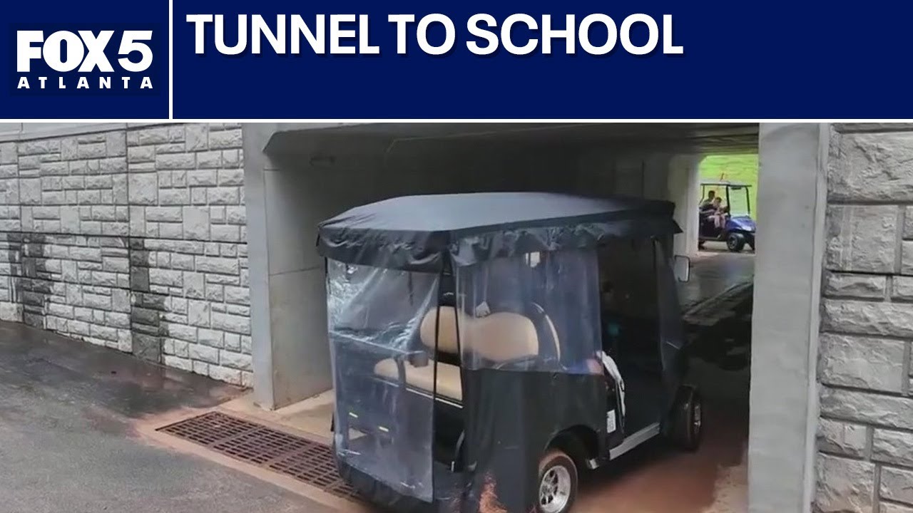 Golf cart tunnel opens for students to get to school