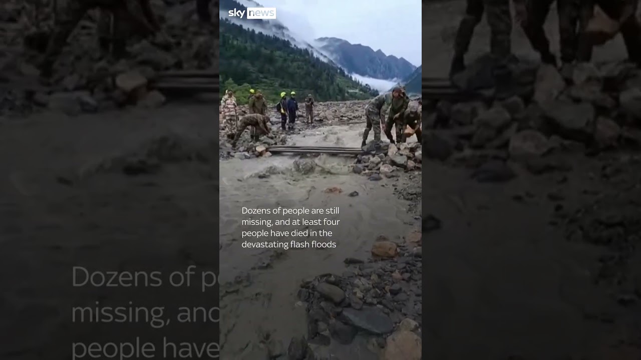 Man crawls through mud after flash floods in India