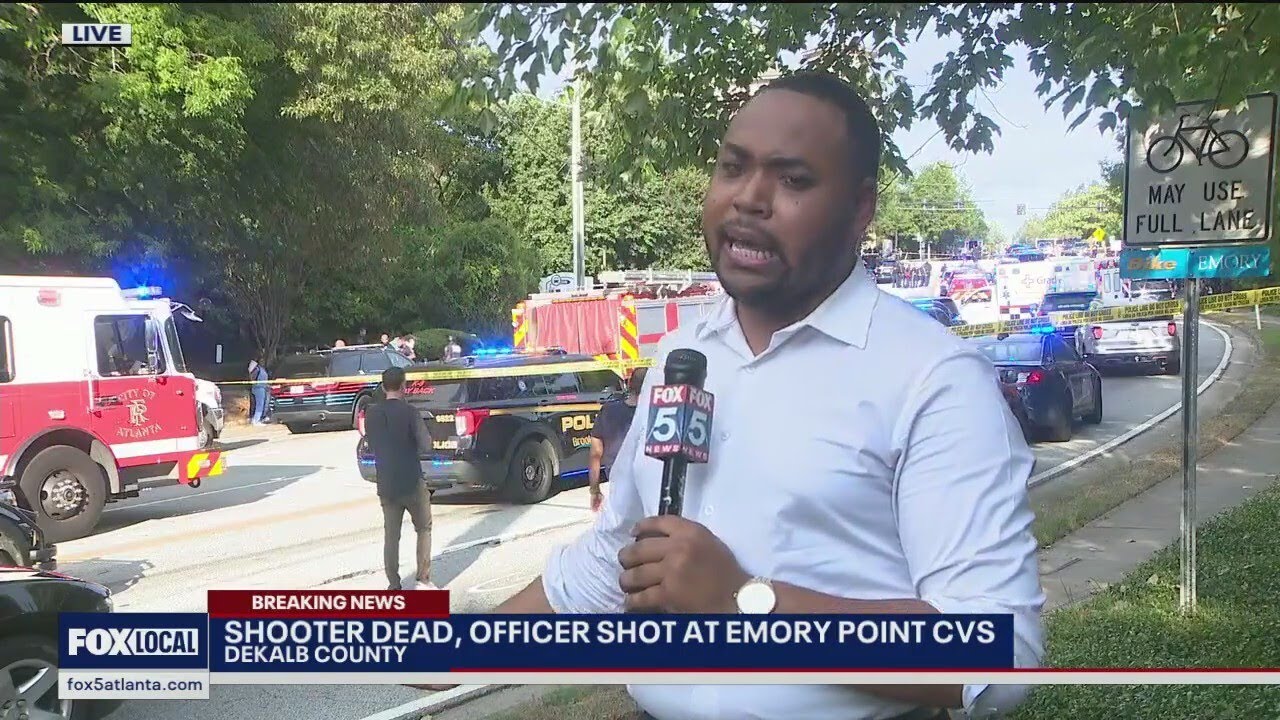 Parents wait to pick up children at day care near Emory Point shooting scene