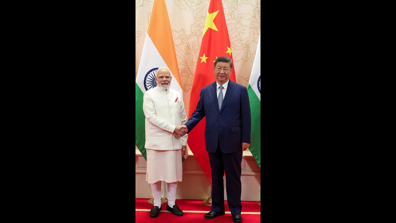 Rivals Xi and Modi Pledge Closer Ties