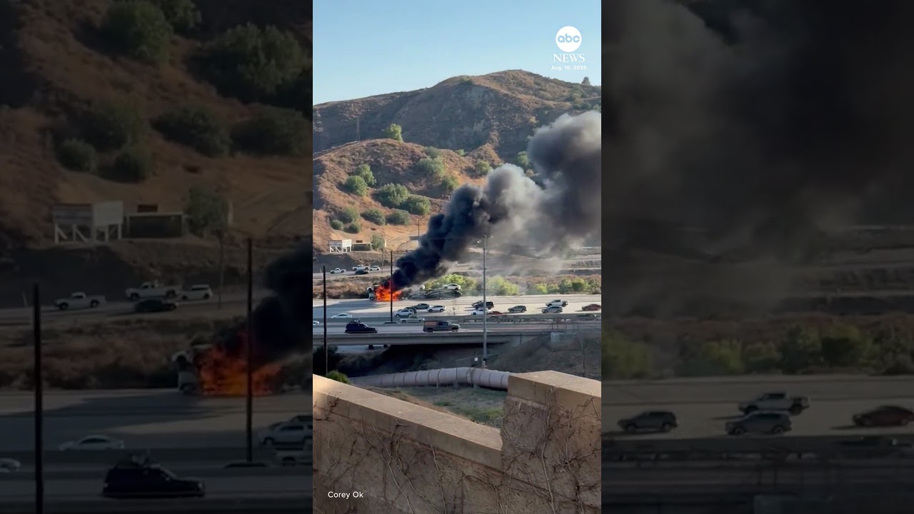 Smoke billows after semi-truck carrying Teslas catches fire
