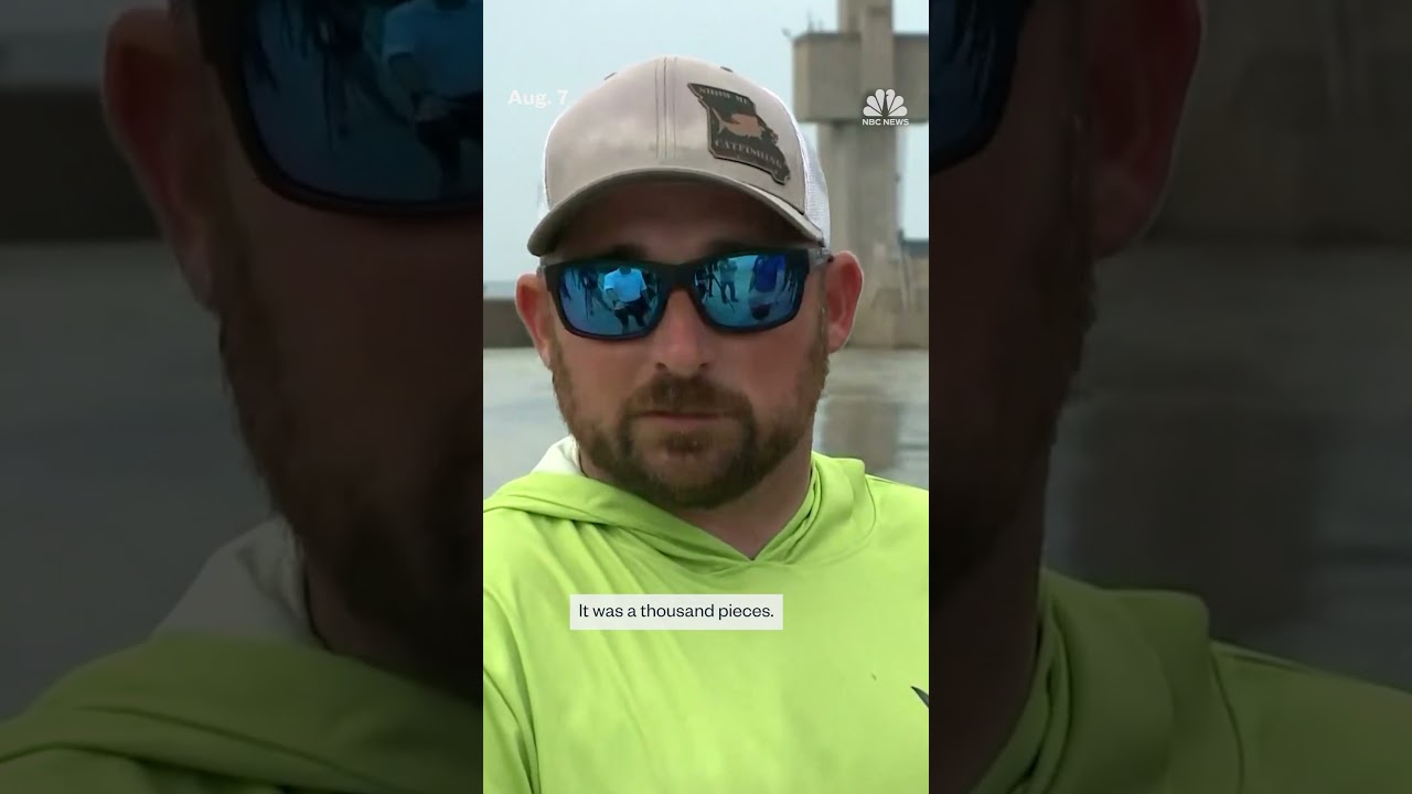 Two dead after chopper hits power line and crashes over Mississippi River