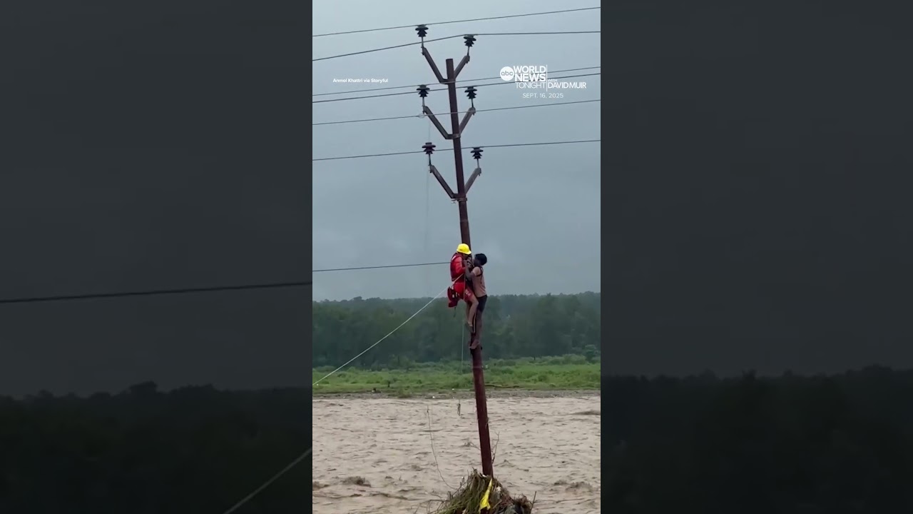 Man saved after clinging to pole for hours amid flooding in India