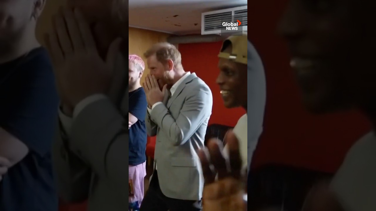 Prince Harry bops to hip hop at UK community recording studio