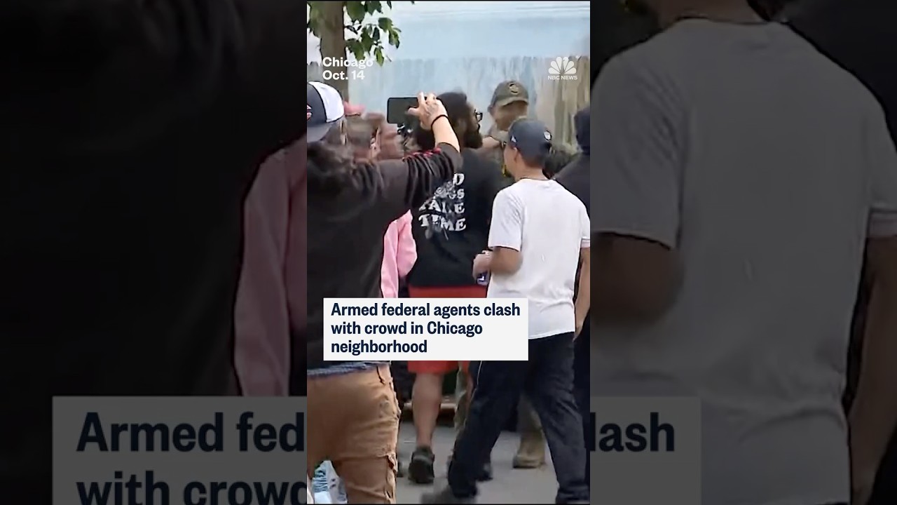 Armed federal agents clash with crowd in Chicago neighborhood