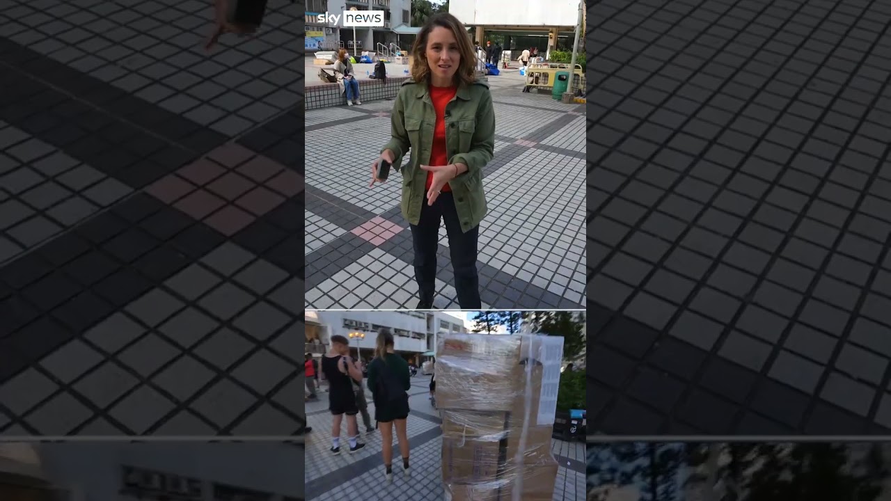 Hong Kong authorities clear out block fire volunteers