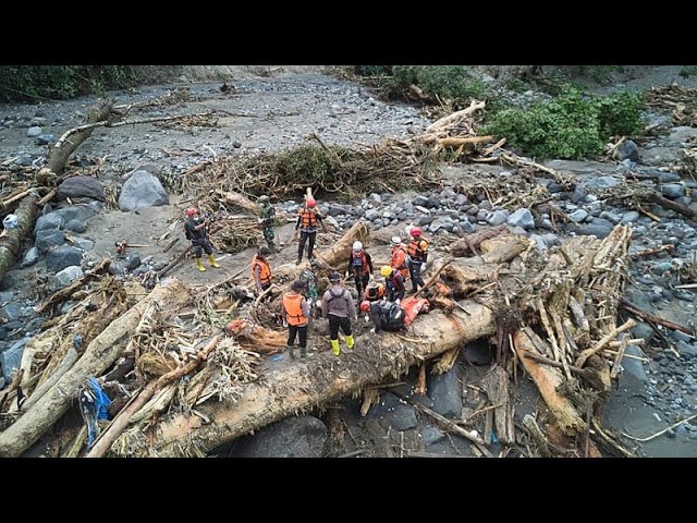 Indonesian rescuers search for survivors as death toll from floods and landslides rises to 442