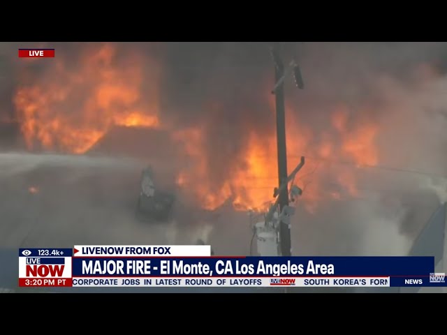 SKYFOX: Firefighters battle raging metals warehouse fire in LA