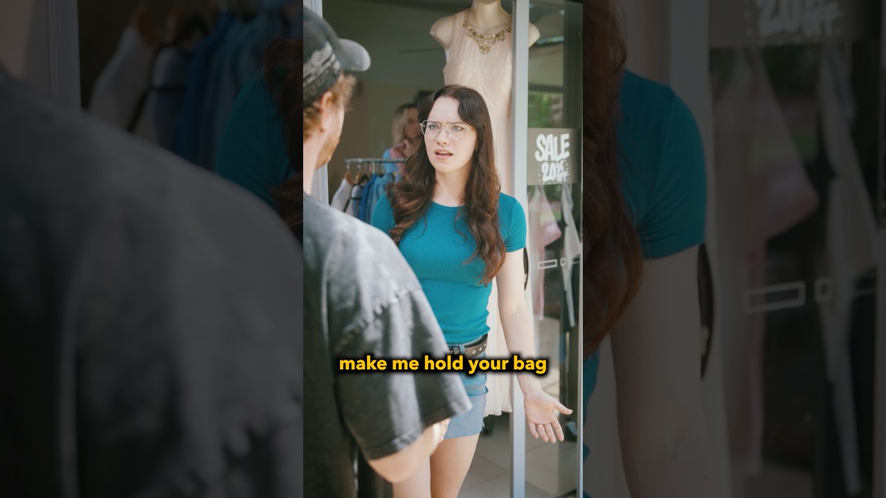 When she makes you hold her purse