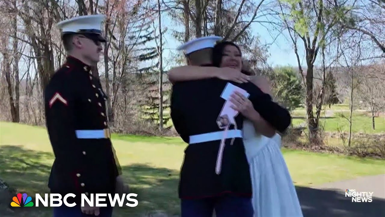 Tearful reunion: Marines surprise their older sister at her wedding