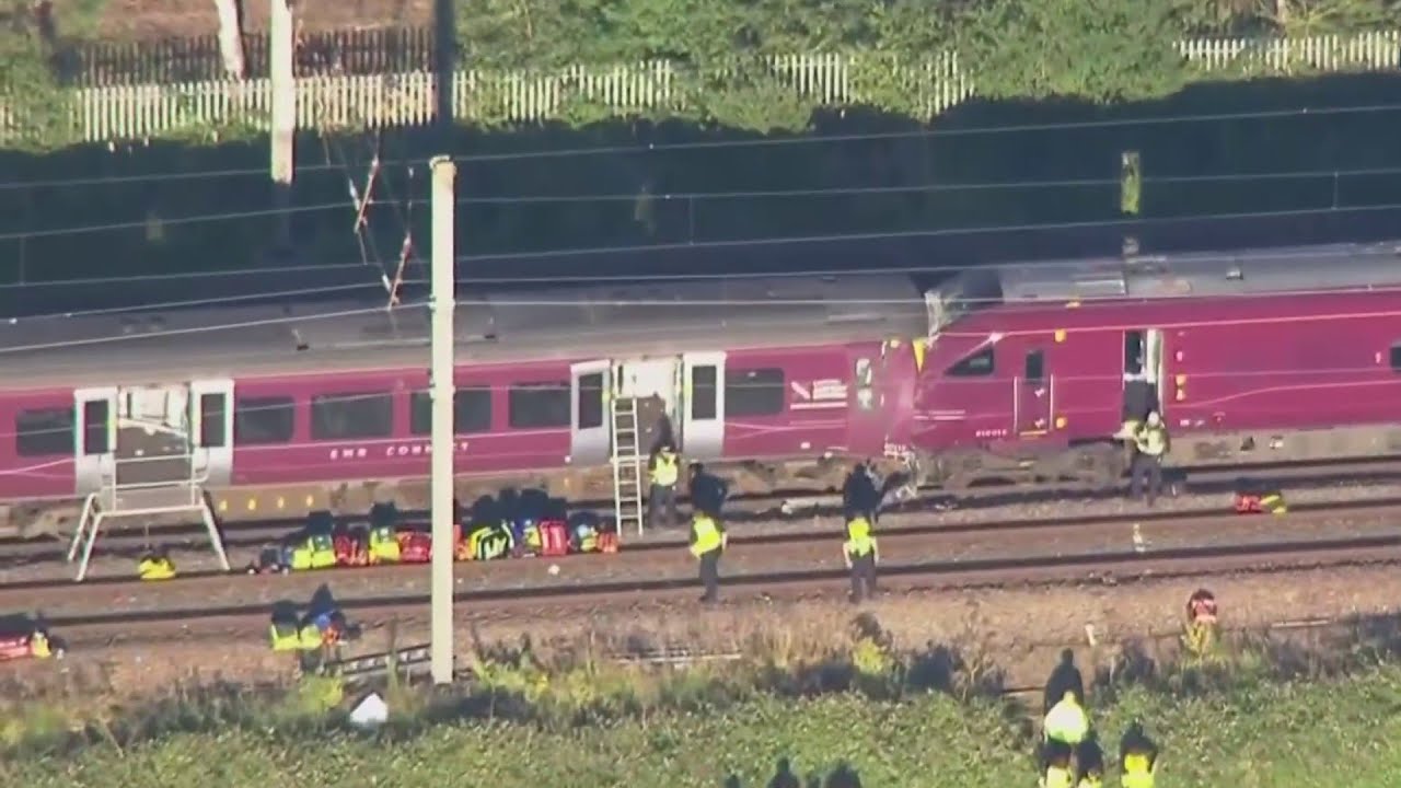1 person killed, dozens injured after two trains collide north of London 