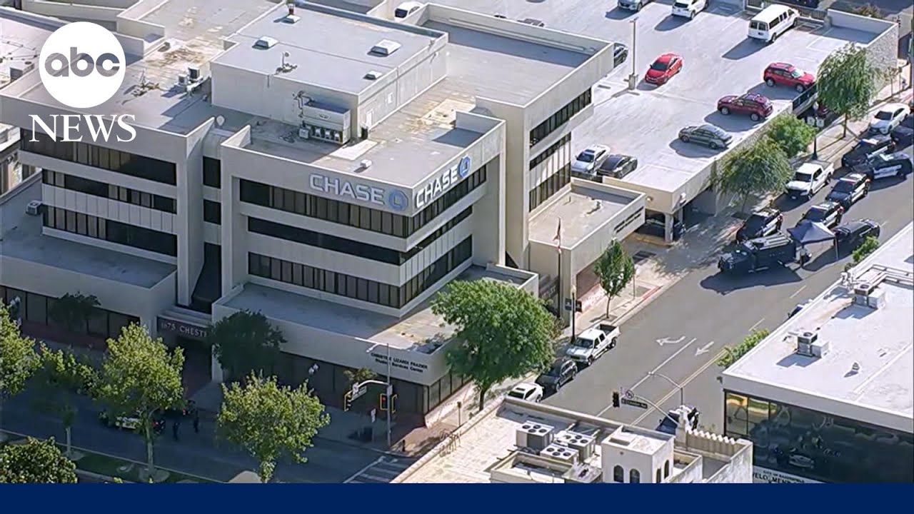 Man barricades himself inside bank with hostages after bomb threat