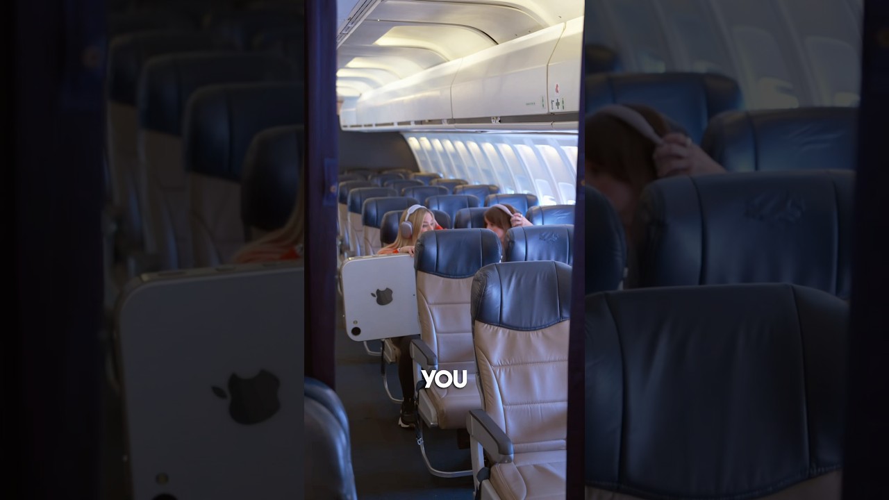 Massive iPhone in airplane overhead!