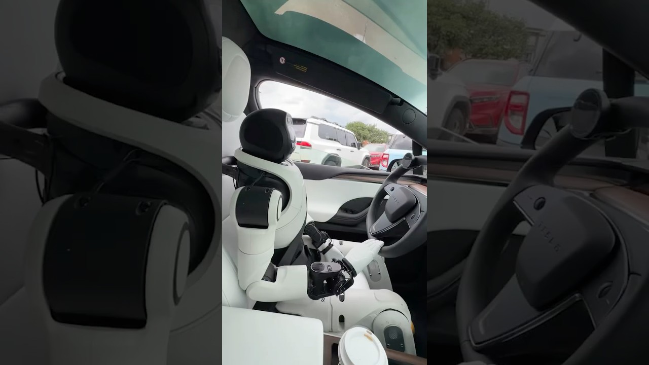 Robot driving a Tesla?! 🫣