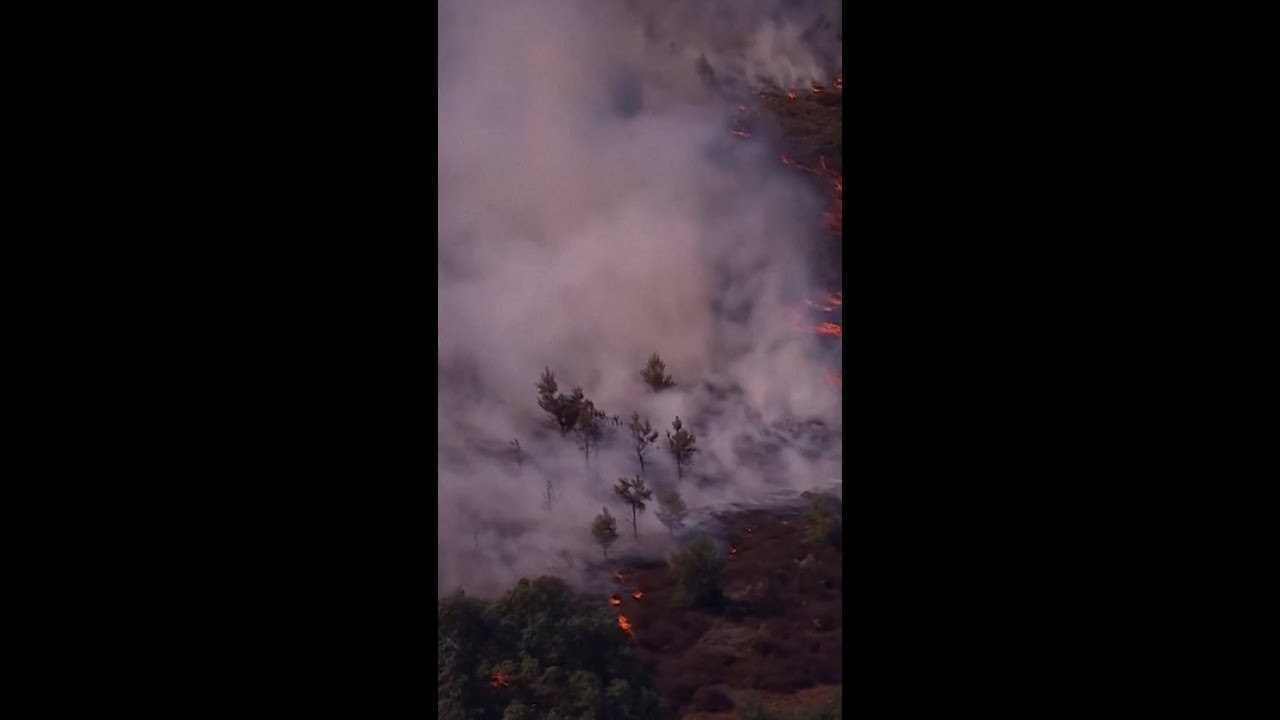 Aerials show wildfire burning on England’s Suffolk coast