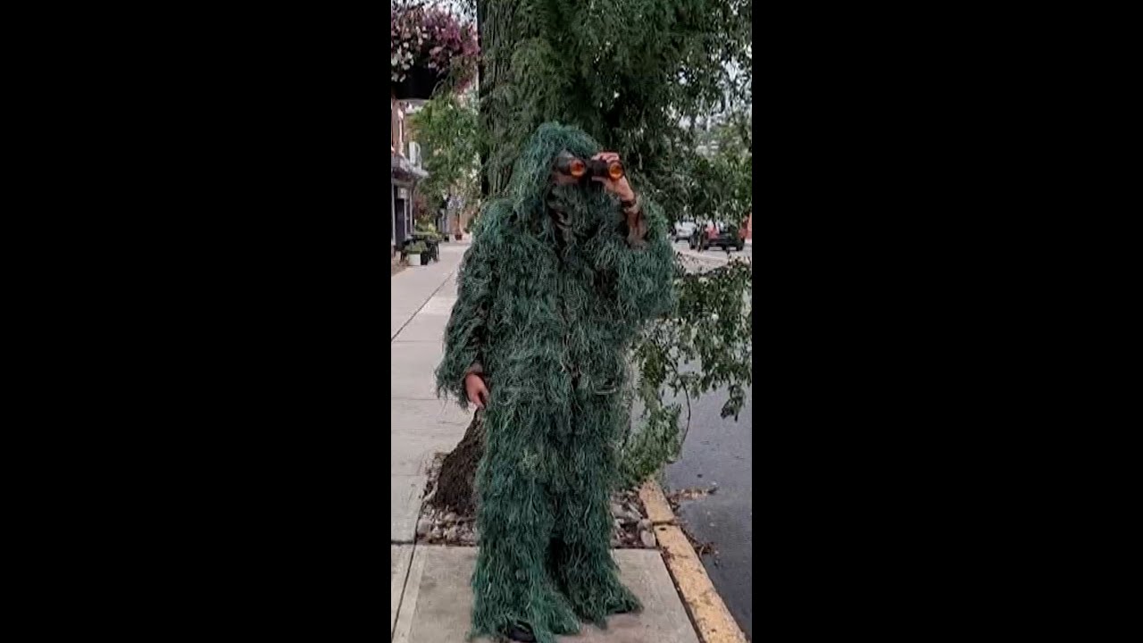 Cop dresses as a shrub to catch distracted drivers