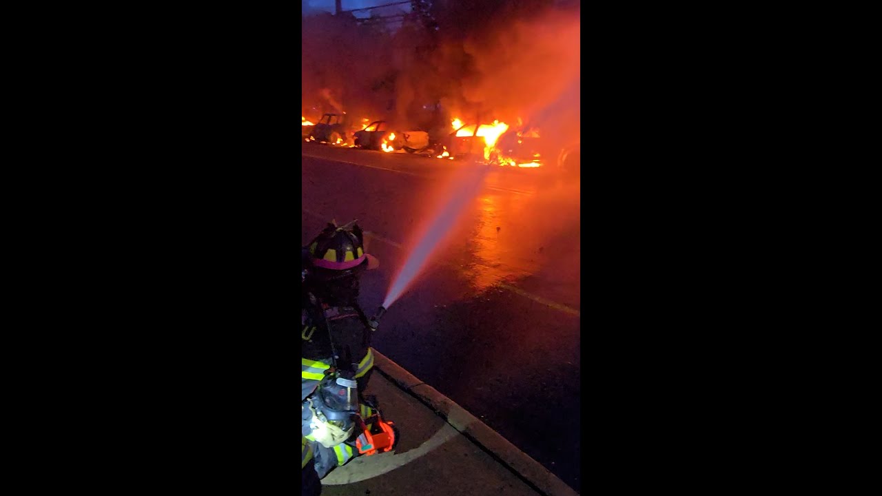 Fallen utility pole sparks blaze and burns seven cars