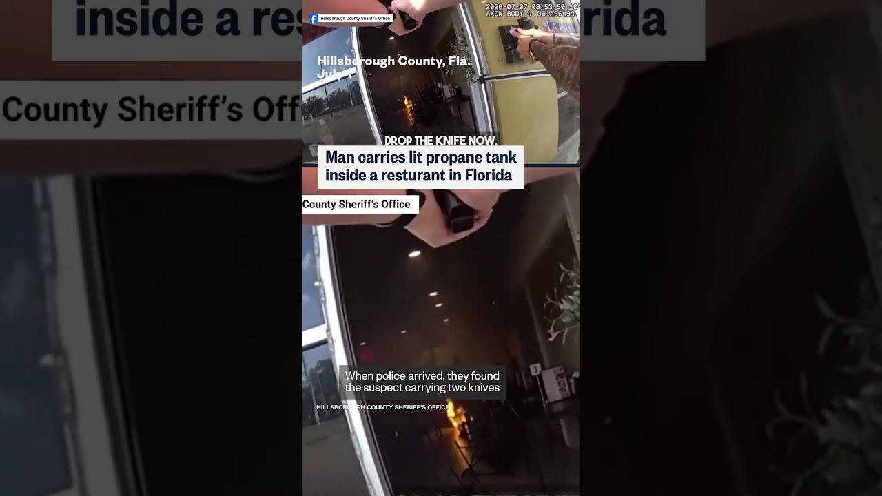 Man carries lit propane tank into Florida restaurant