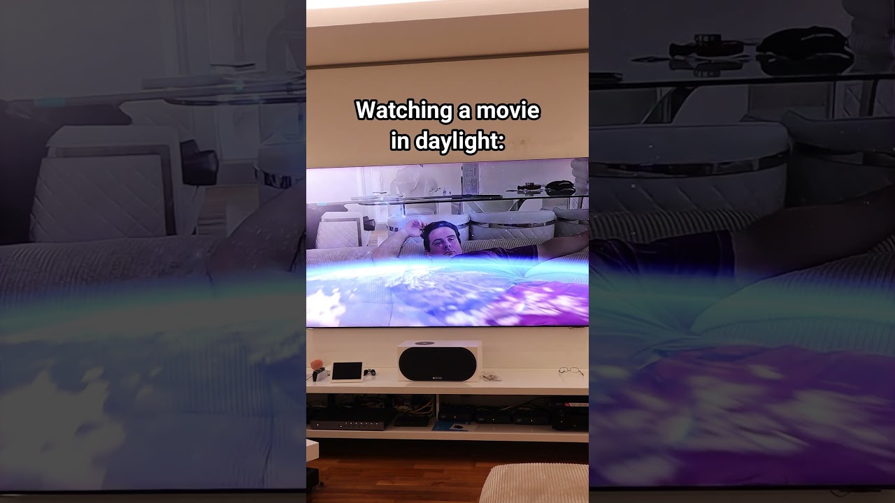 Watching A Movie In Daylight.