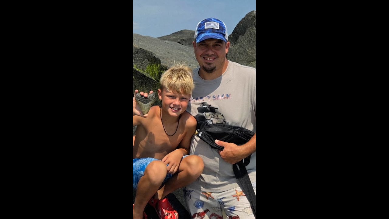 Father and son find megalodon tooth at New Jersey beach