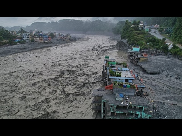 Hundreds of unidentified flood victims ‘temporarily buried’ in Nepal
