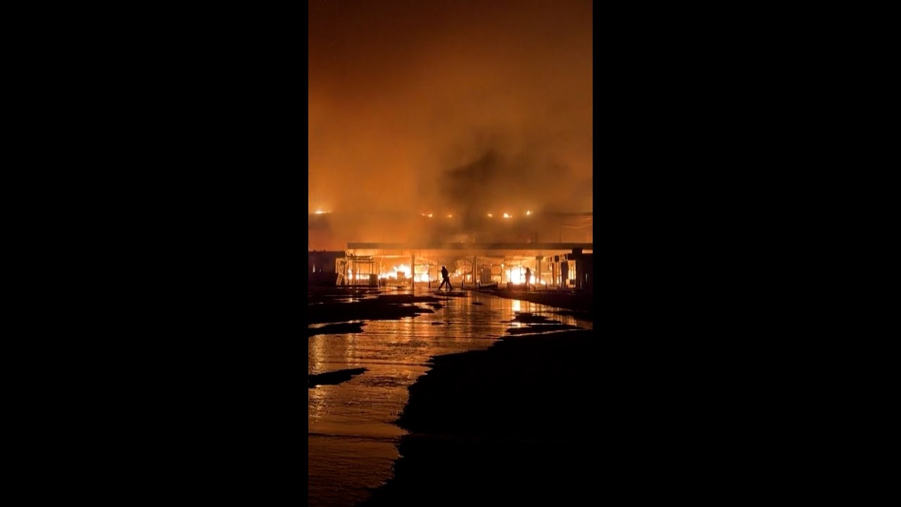 Ukrainian mall engulfed in flames after Russian attack