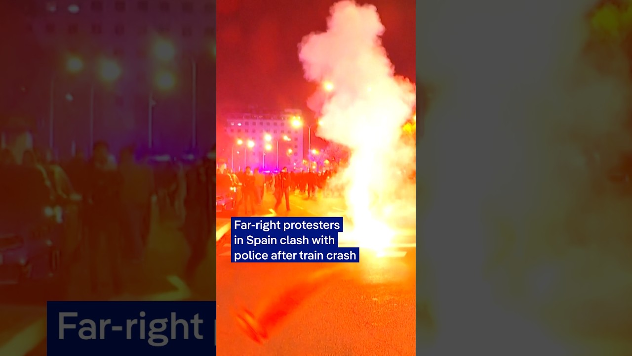 Far-right protesters in Spain clash with police after train crash | DW News