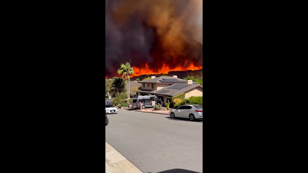 Thousands of homes threatened by California wildfires